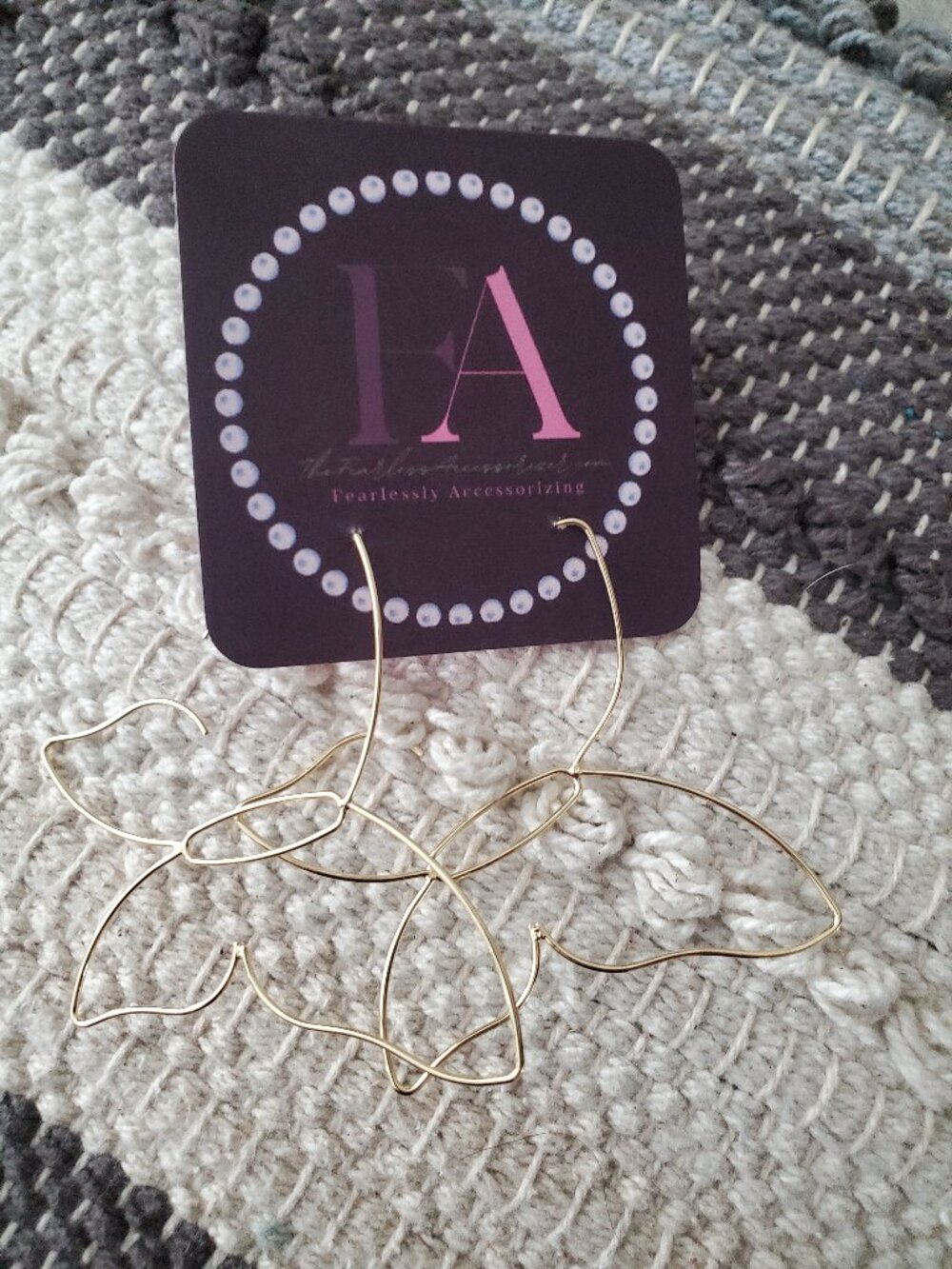 Gold butterfly hoop earrings